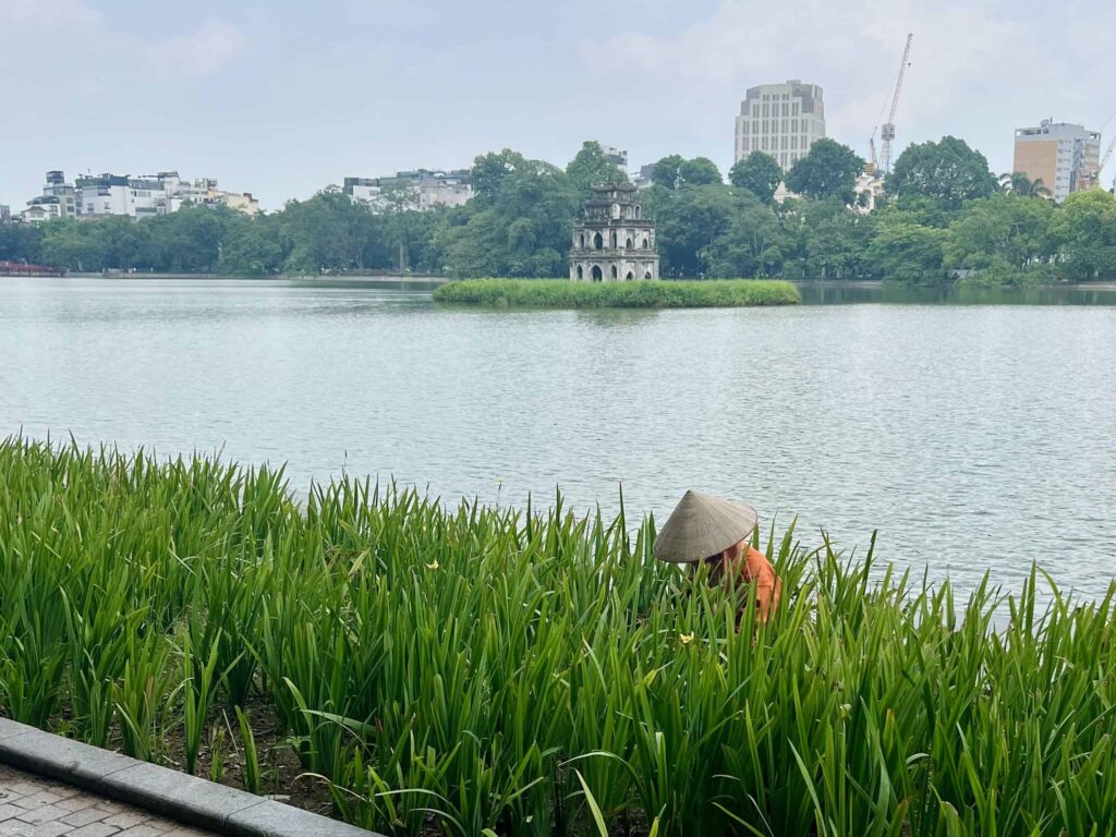 The sidewalk around Hoan Kiem Lake in Hanoi's Old Quarter offers great views.