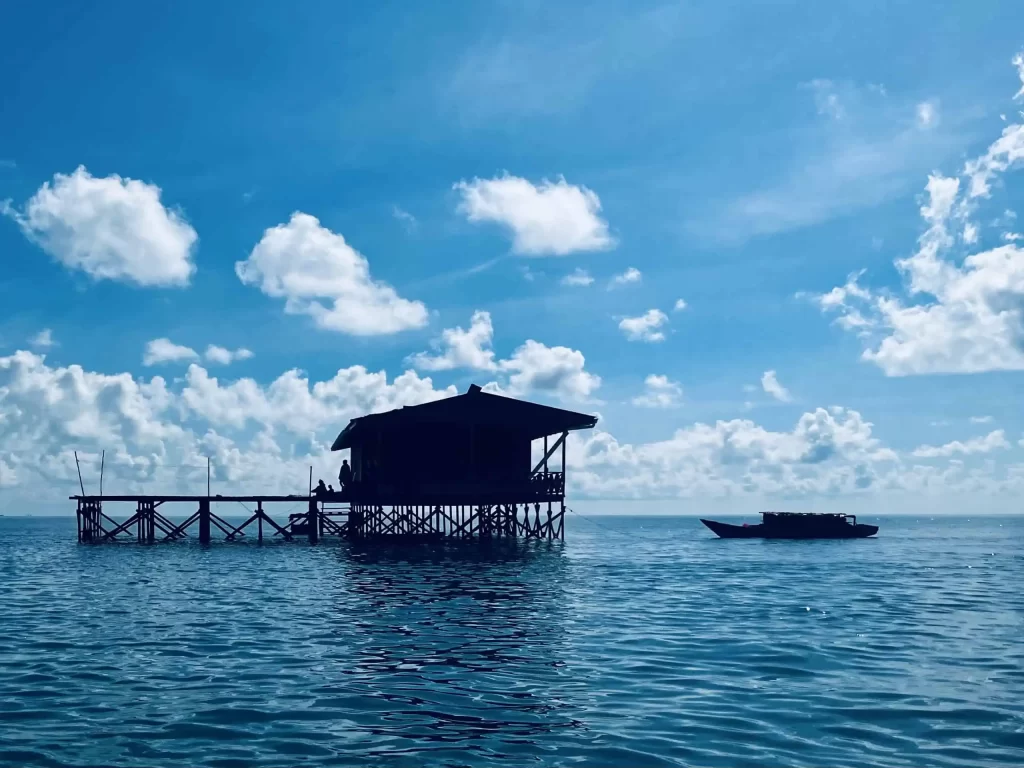 Visiting Semporna: What to Know Before You Dive or Transit 6 A Bajau-Laut wooden house on stilts over the water in Semporna.