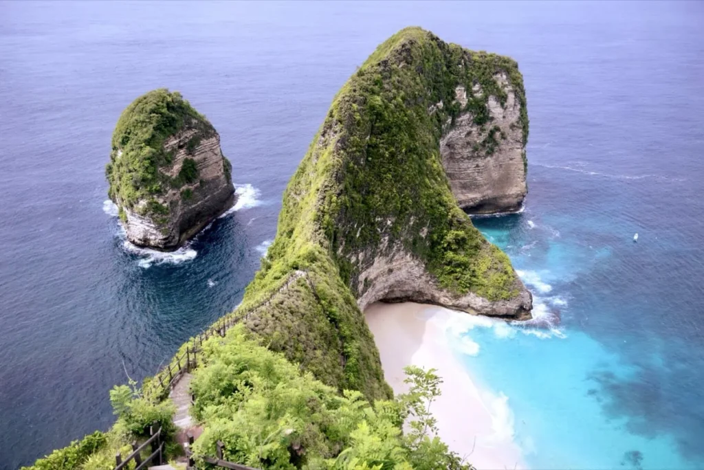 Iconic cliff view of Kelingking Beach with its T-Rex-shaped headland, one of the most famous sights on Nusa Penida.
